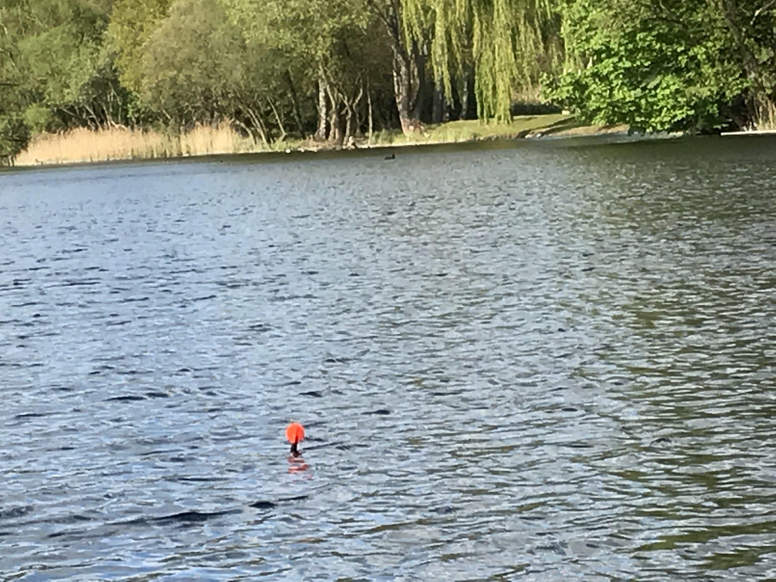 Setting up marker float to feature find lake bed areas to place end tackle