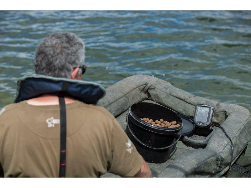 using a rowing boat to bait up